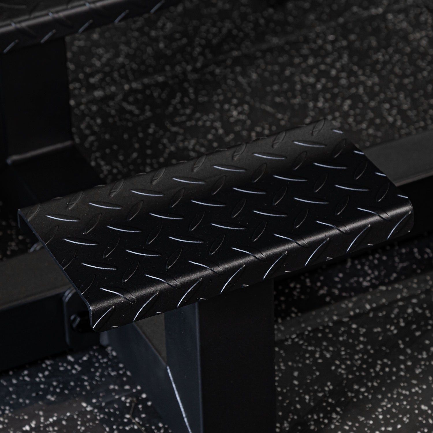 black prone row gym bench foot step