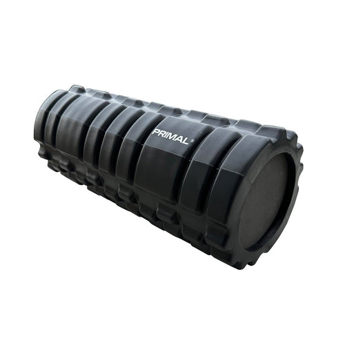 A black foam roller.