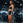 Woman lifting a barbell with Primal weights in a gym setting