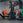 An athlete performing a deadlift using a loaded deadlift barbell.