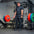 An athlete performing a deadlift using a loaded deadlift barbell.