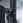 A magnetic lockjaw collar stuck to a steel gym rack frame.