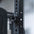 A magnetic lockjaw collar stuck to a steel gym rack frame.