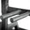 A close up of a dip handle attachment on a half rack.