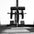 A pulley attachment used for low row exercises on a half rack.
