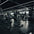 A plate loaded seated calf raise machine in a gym.