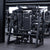 Angled view of plate-loaded pullover machine in gym setting.