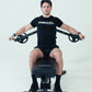 An athlete using a pec fly attachment on a weight bench.