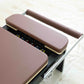 Close up of the padding on a pilates reormer bed.