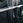 A barbell resting on a j-hook.