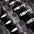 A close up of hex dumbbells with steel handles.