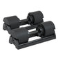 A pair of black 40kg adjustable dumbbells in storage cases.