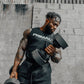 An athlete performing a bicep curl with an adjustable dumbbell.