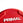 Red urethane bumper plate with Primal branding and contoured grip handle