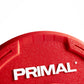 Red urethane bumper plate with Primal branding and contoured grip handle